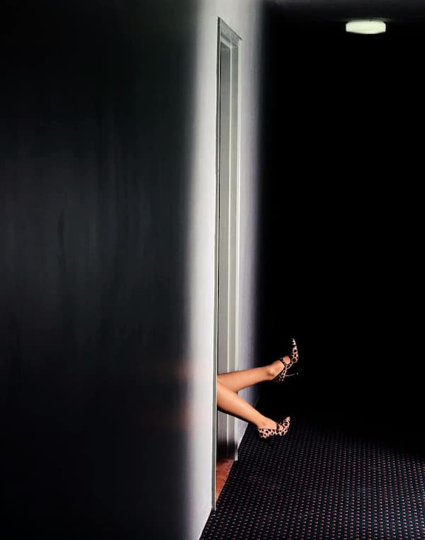 Legs in Hallway