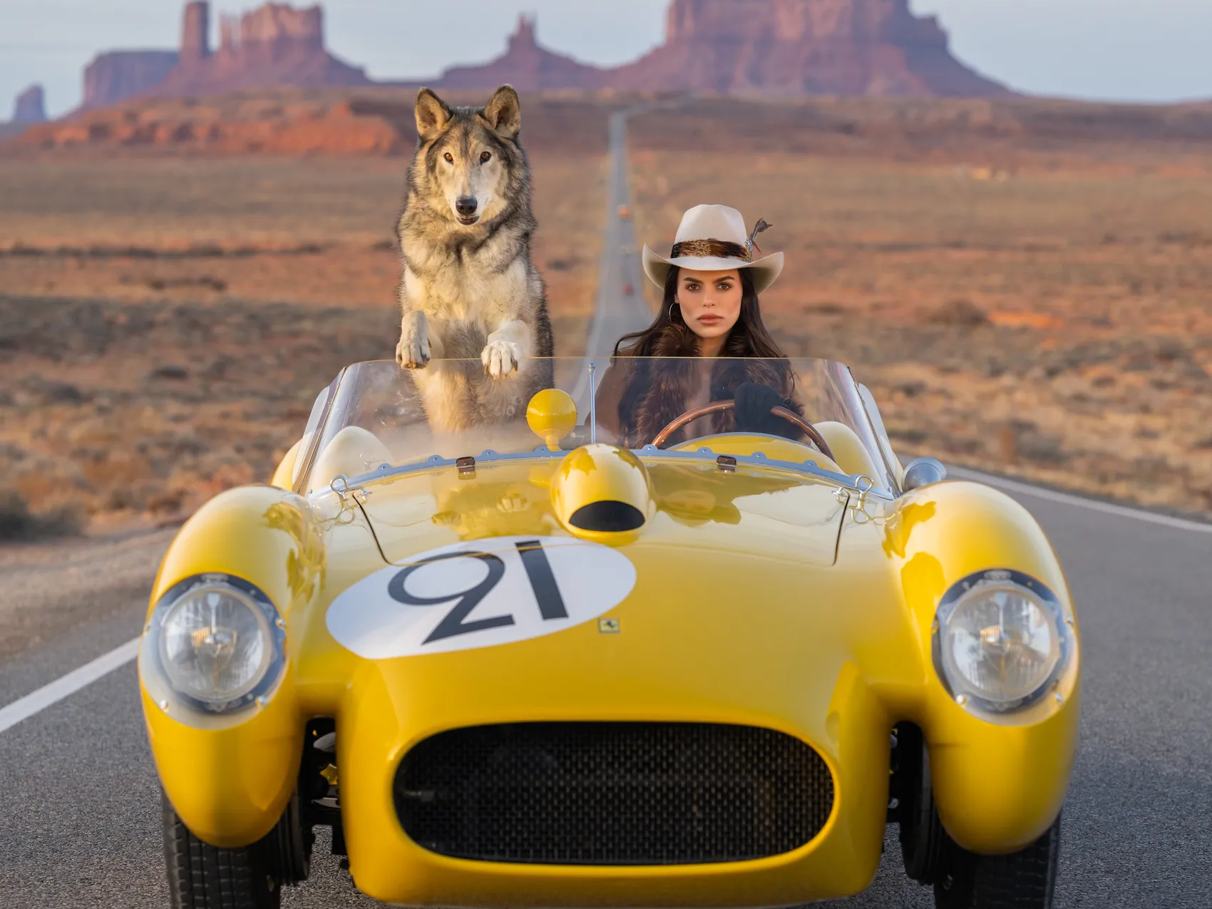 Testarossa (Colour) by David Yarrow | Fine Art Photography | Brooks Nader Driving Yellow 1957 Ferrari Testarossa With a Wolf – Available at Hilton Contemporary Gallery Chicago