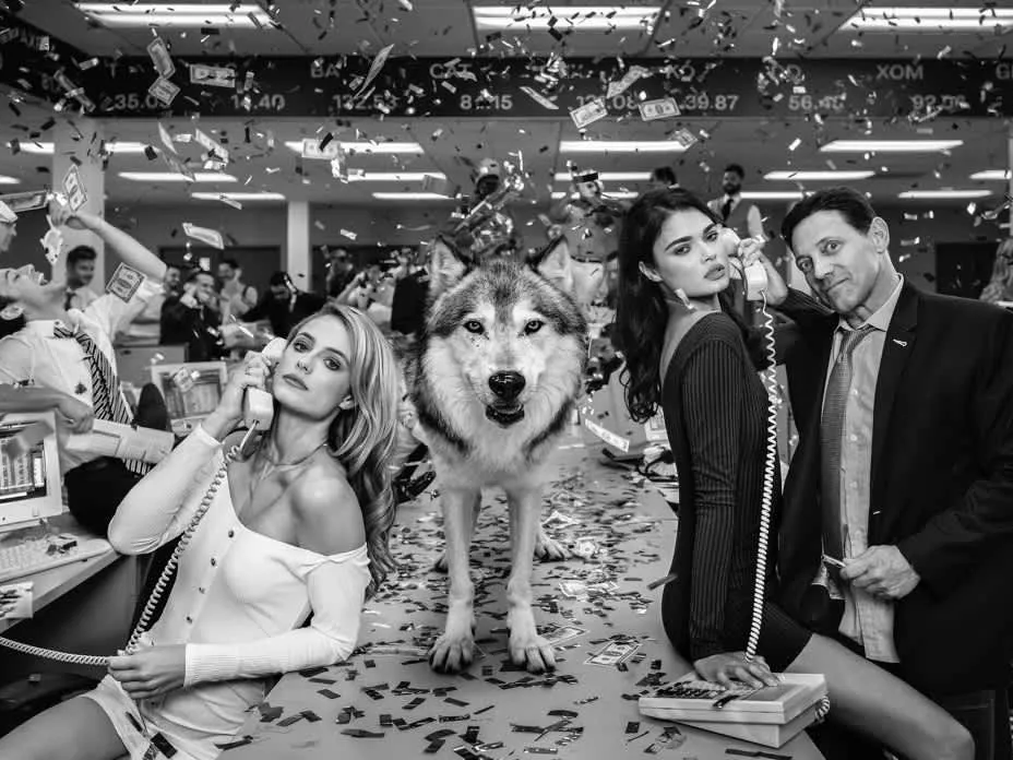 The Wolves of Wall Street II by David Yarrow – Jordan Belfort and Supermodels With Wolf on a Table and Money Flying in the Air – Available at Hilton Contemporary Gallery Chicago