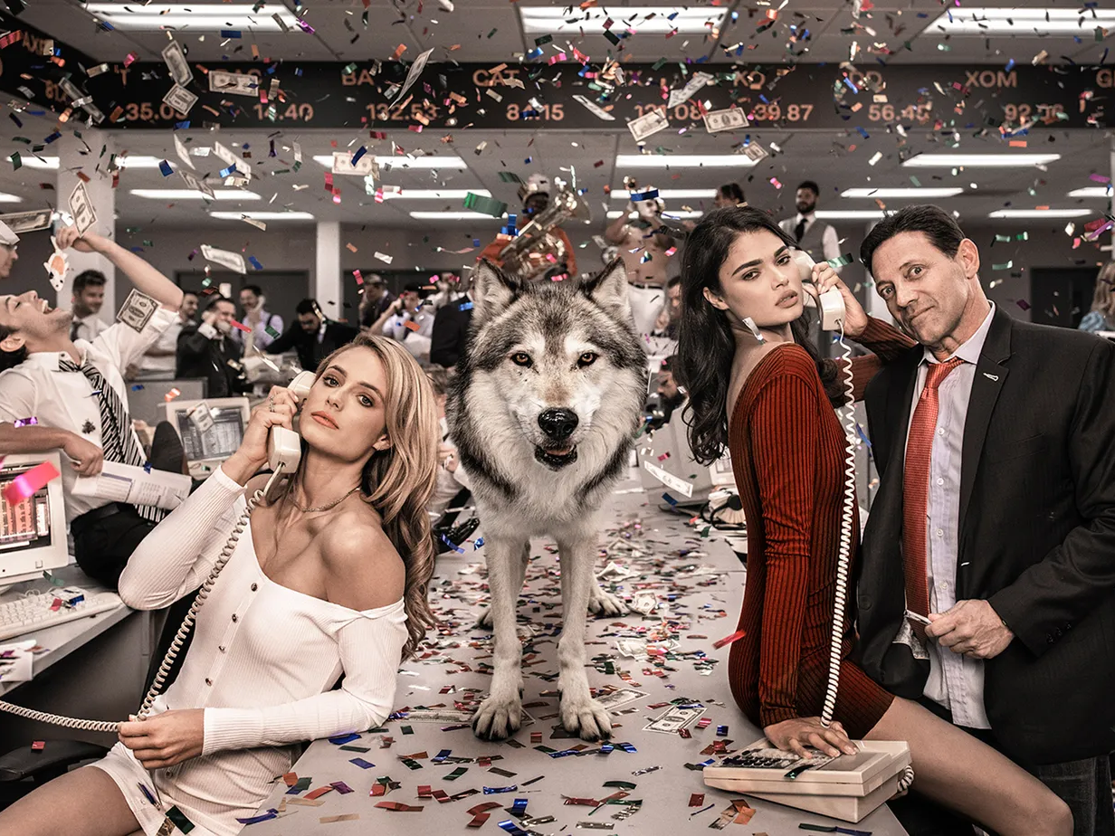 The Wolves of Wall Street II by David Yarrow – Jordan Belfort and Supermodels With Wolf on a Table and Money Flying in the Air – In Color - Available at Hilton Contemporary Gallery Chicago