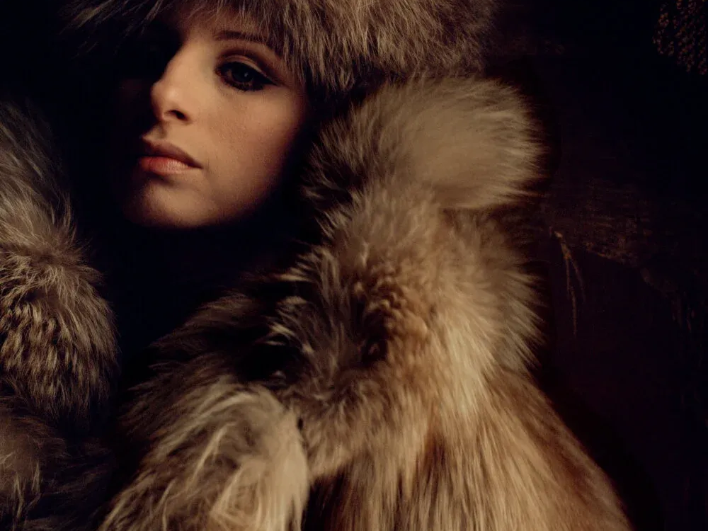 Barbra Streisand draped in fur in New York, photographed by Lawrence Schiller for McCall’s magazine, 1969
