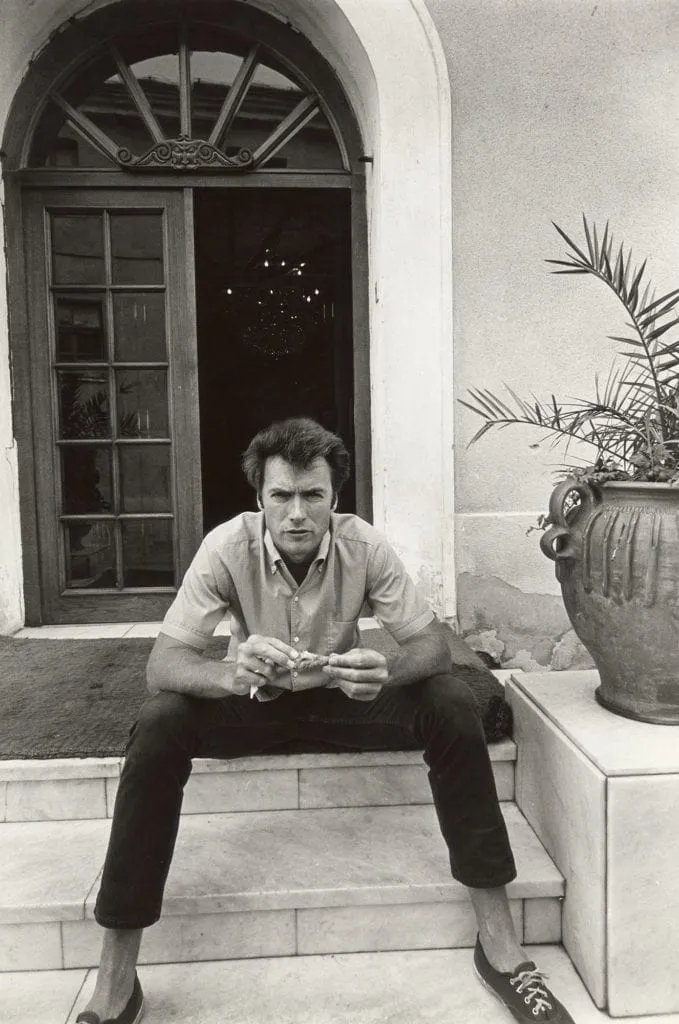 Clint Eastwood on his day off during Kelly’s Heroes filming, seated outside a villa in Vižinada, Yugoslavia, 1969