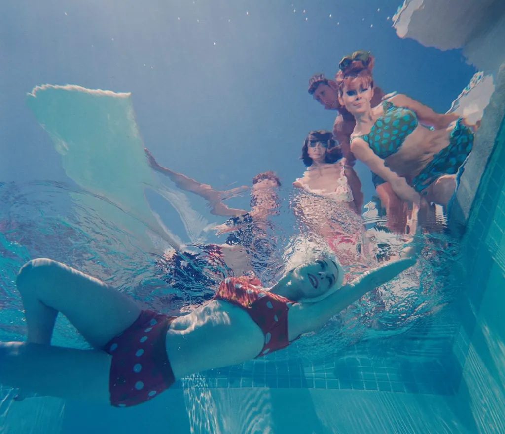Palm Springs underwater fashion photograph of swimwear models in a swimming pool, 1964