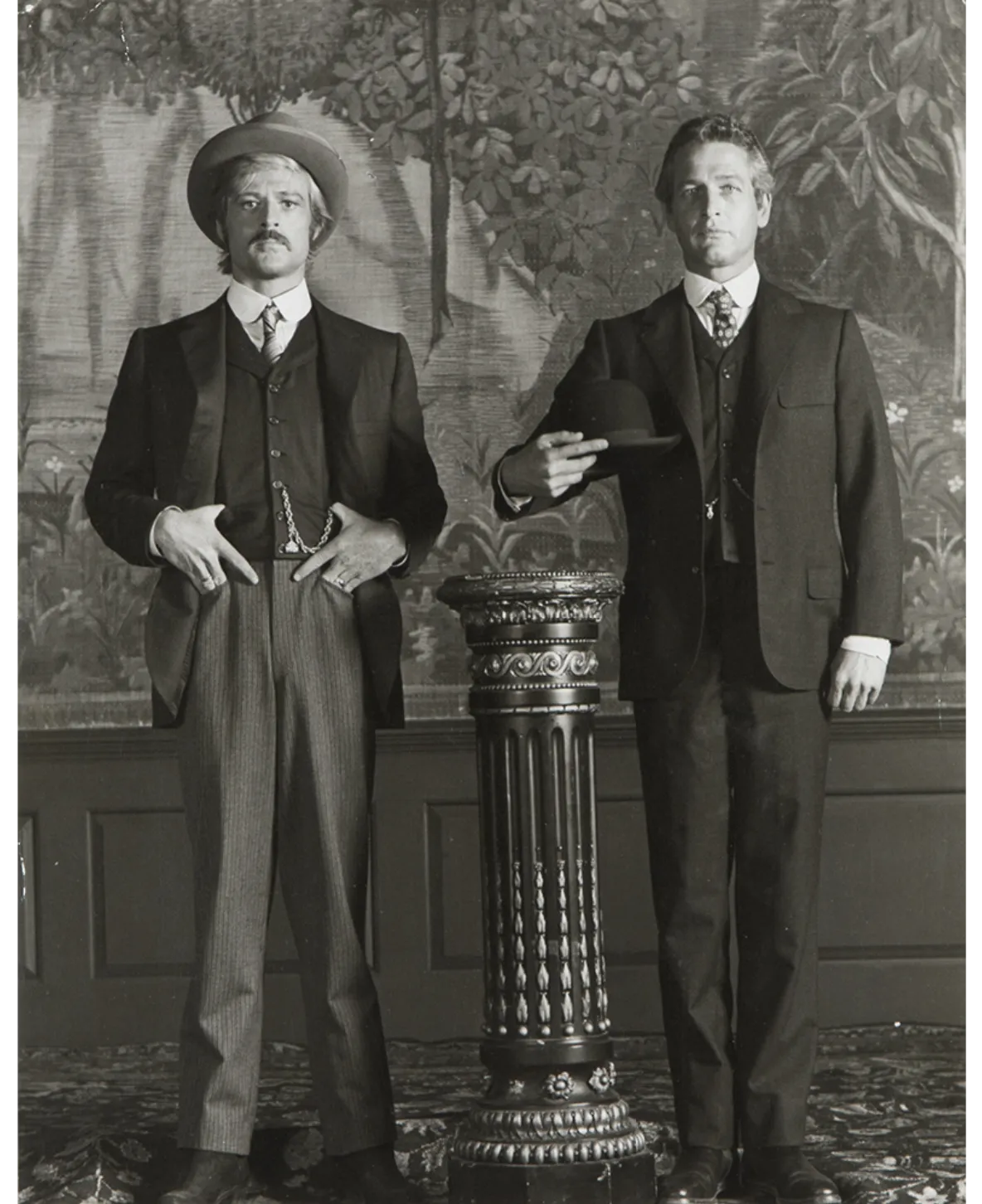 Paul Newman and Robert Redford posing in period costume during filming of Butch Cassidy and the Sundance Kid, 1968