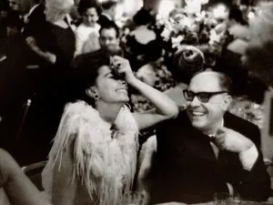 Sophia Loren and Carlo Ponti seated together at the Academy Awards dinner, 1962