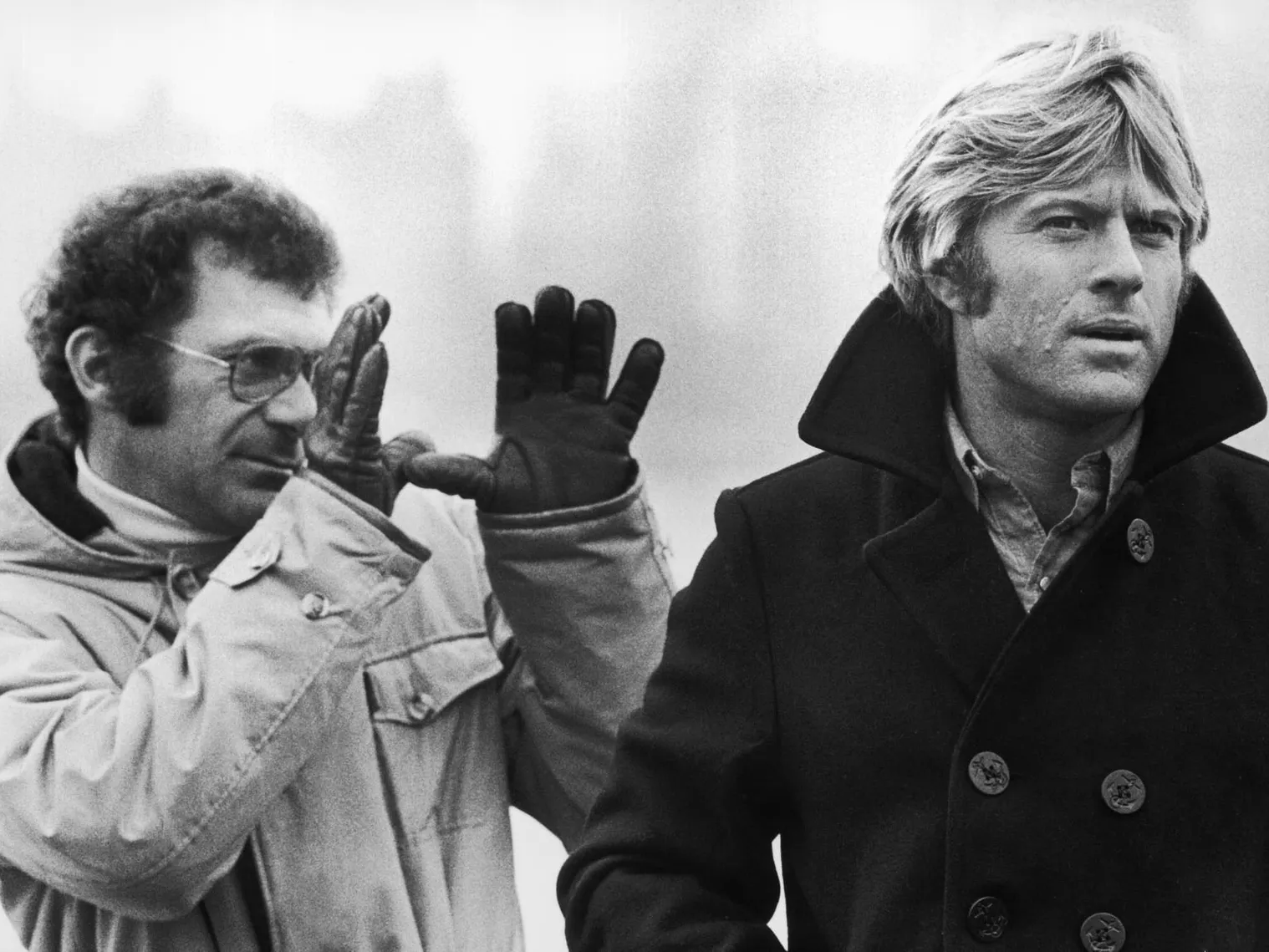 Robert Redford and Sydney Pollack on the set of Three Days of the Condor, photographed by Terry O’Neill, New York, 1974