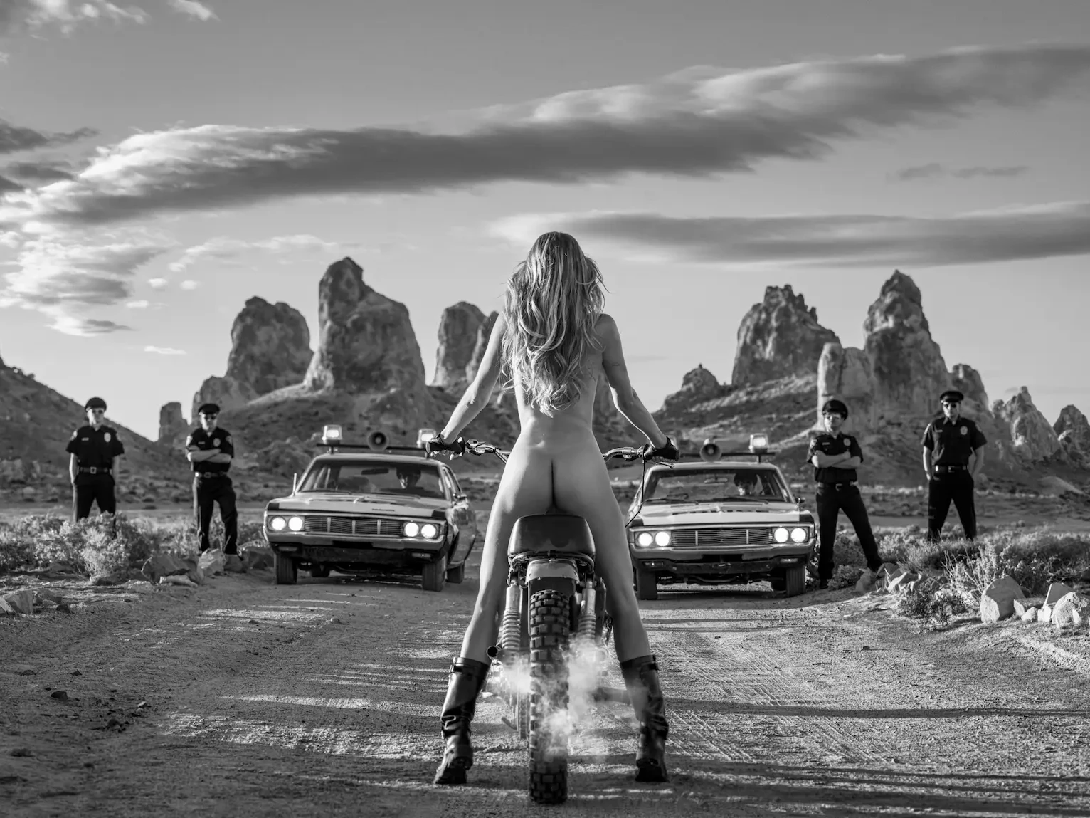 A photograph showing a woman on a motorcycle by photographer David Yarrow.