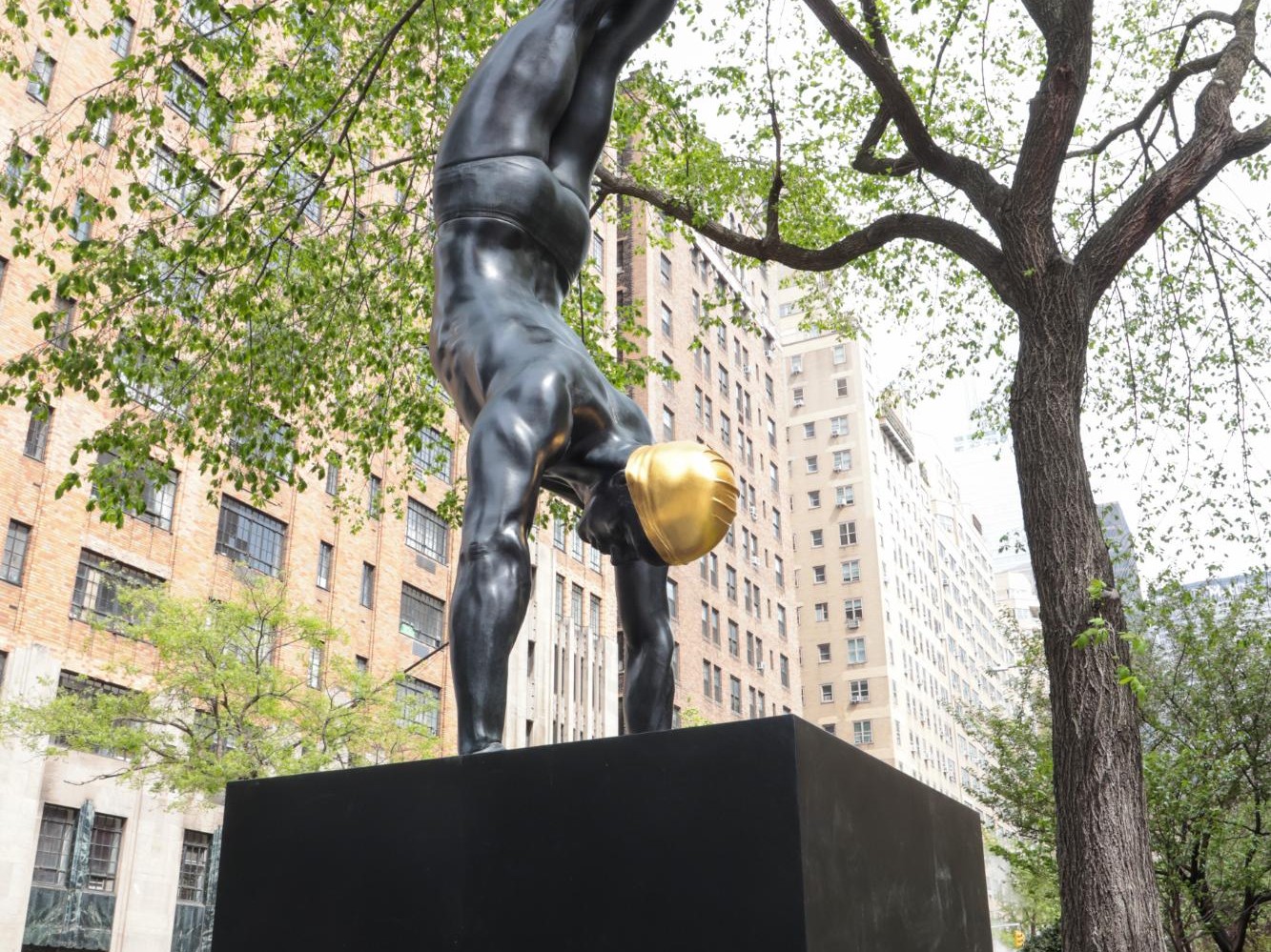 The Golden Mean. A hyper-realistic sculpture by Carole Feuerman. Lacquer on Epoxy with 24k Gold Leaf Cap on Metal Base. Monumental Scale. 150 x 54 x 38 inches. Unique.