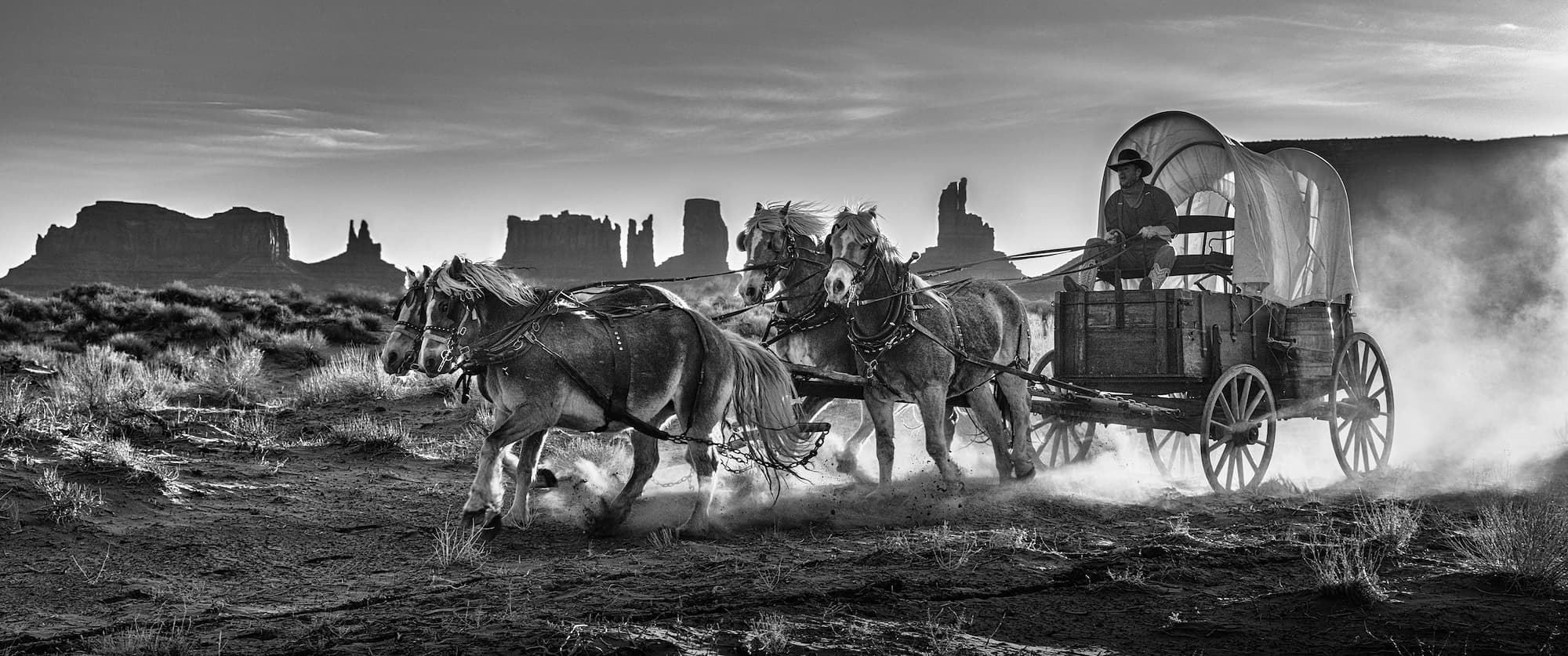 "1880" by David Yarrow, Monument Valley, Utah, 2022. Black and white photograph.
