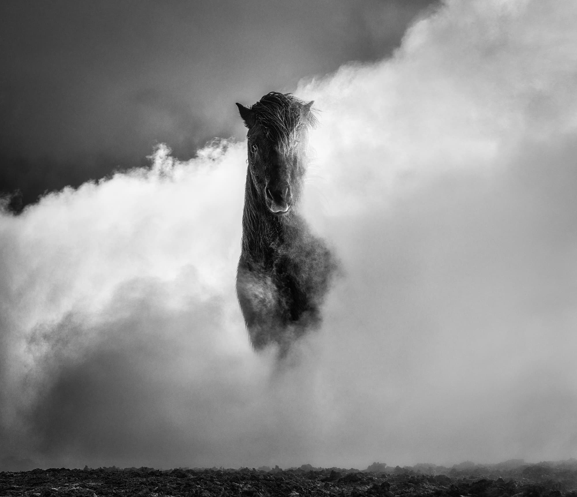 "66 Degrees North" by David Yarrow, Iceland, 2022. Black and white photograph.