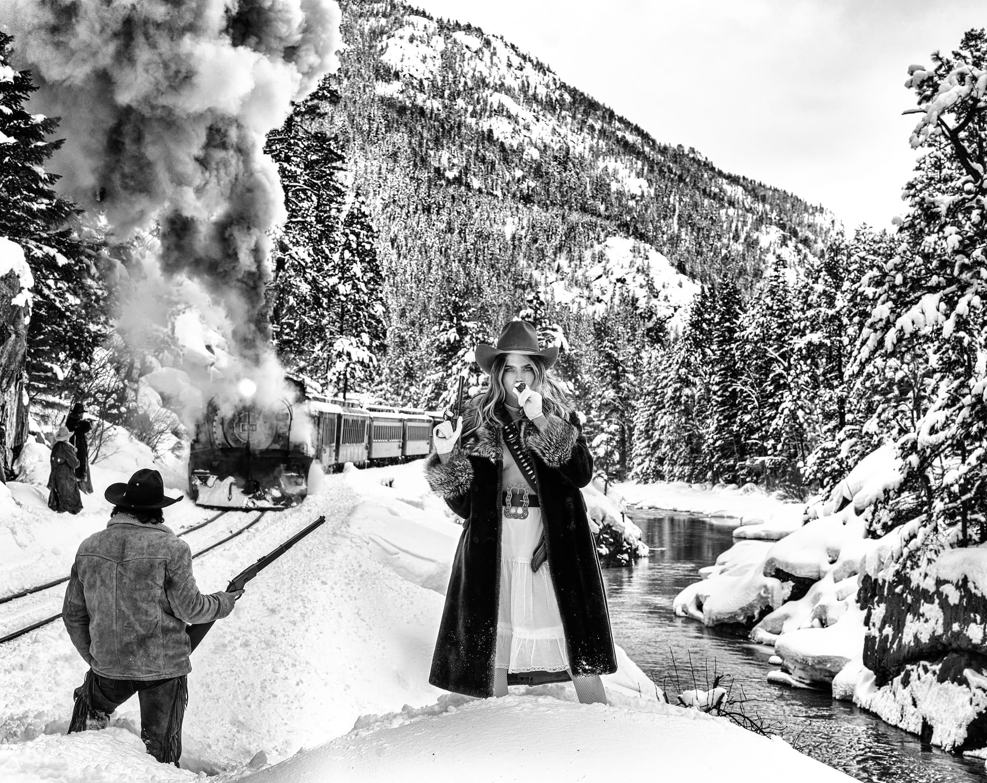 "Cara and the Robbers" by David Yarrow, Durango, Colorado, 2023. Black and white photograph.