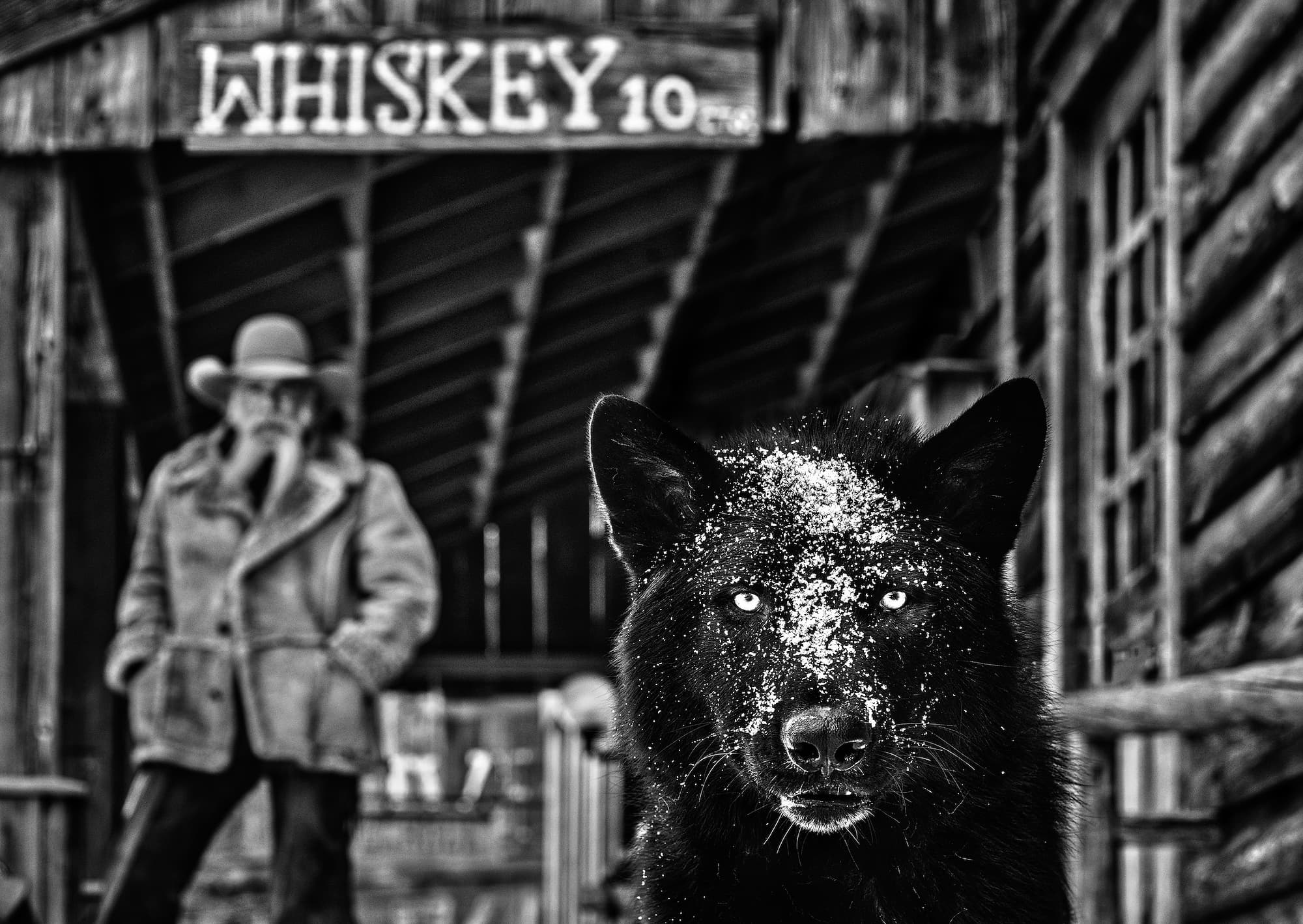 "It was The Whiskey Talking" by David Yarrow, Crazy Mountain Ranch, Montana, 2022. Black and white photograph.