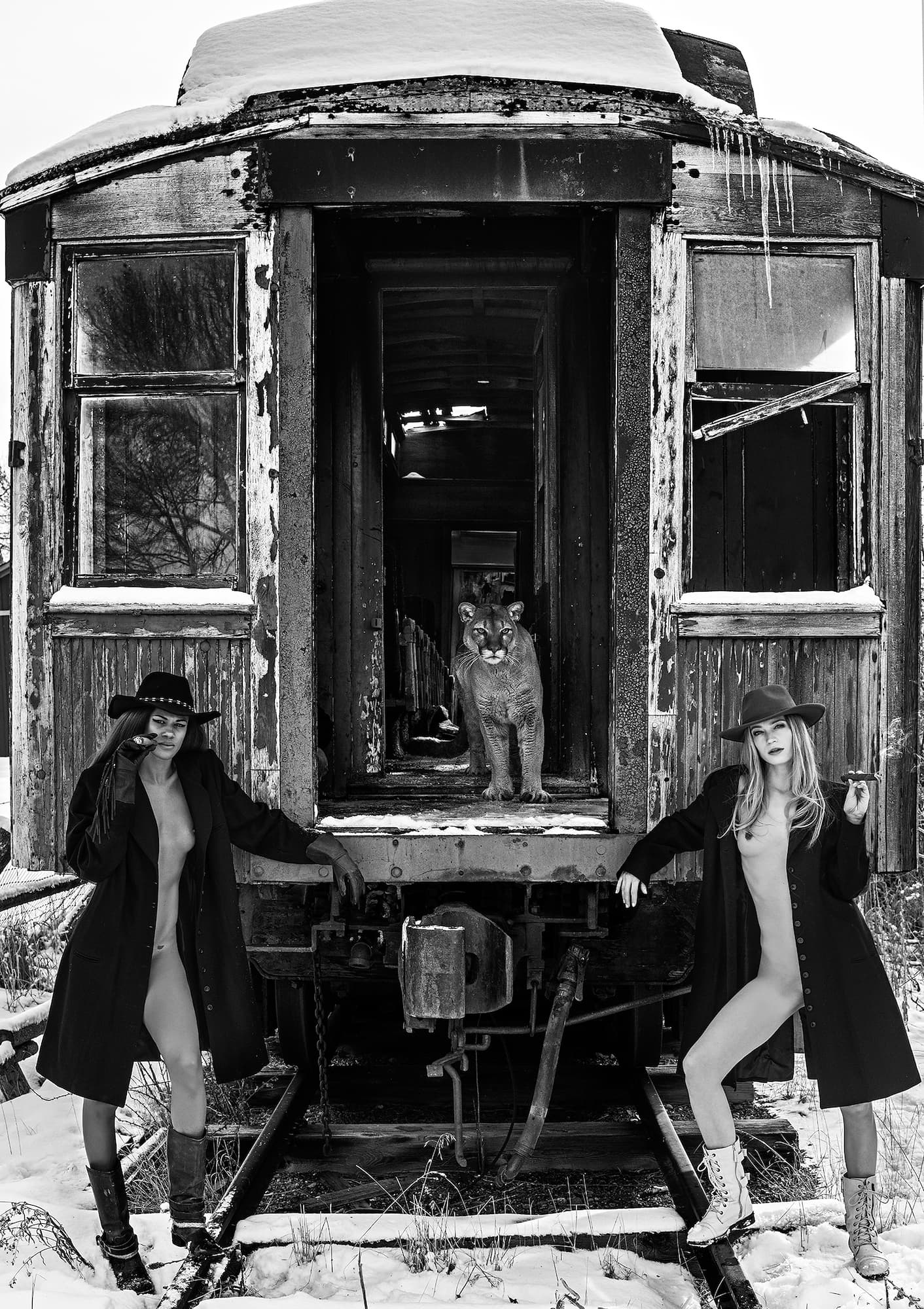 "Let's Catch The Last Train Home" by David Yarrow, Nevada City, Montana, 2017. Black and white photograph.