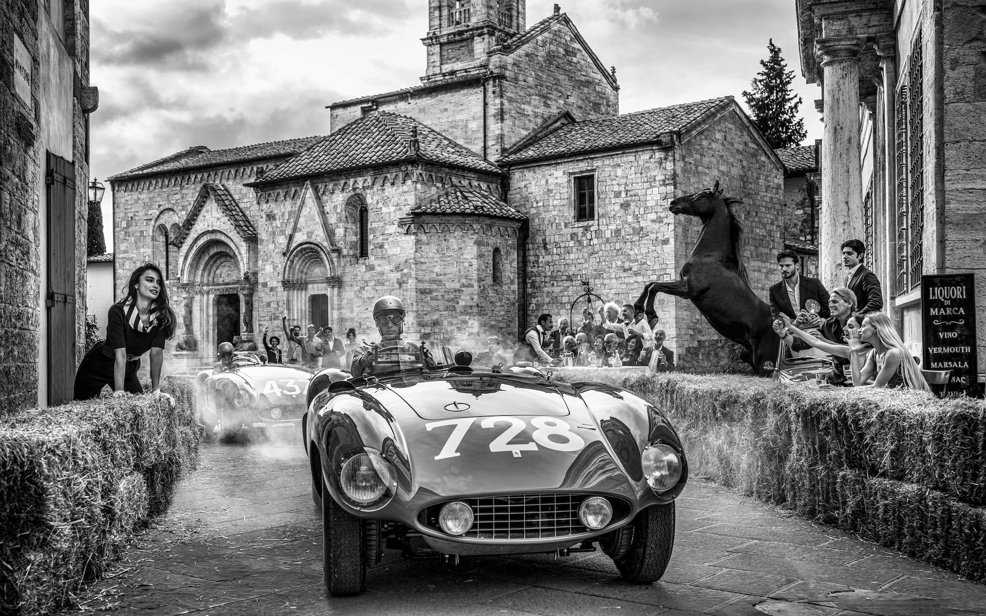 "Mille Miglia" by David Yarrow, Tuscany, Italy, 2026. Black and white photograph.