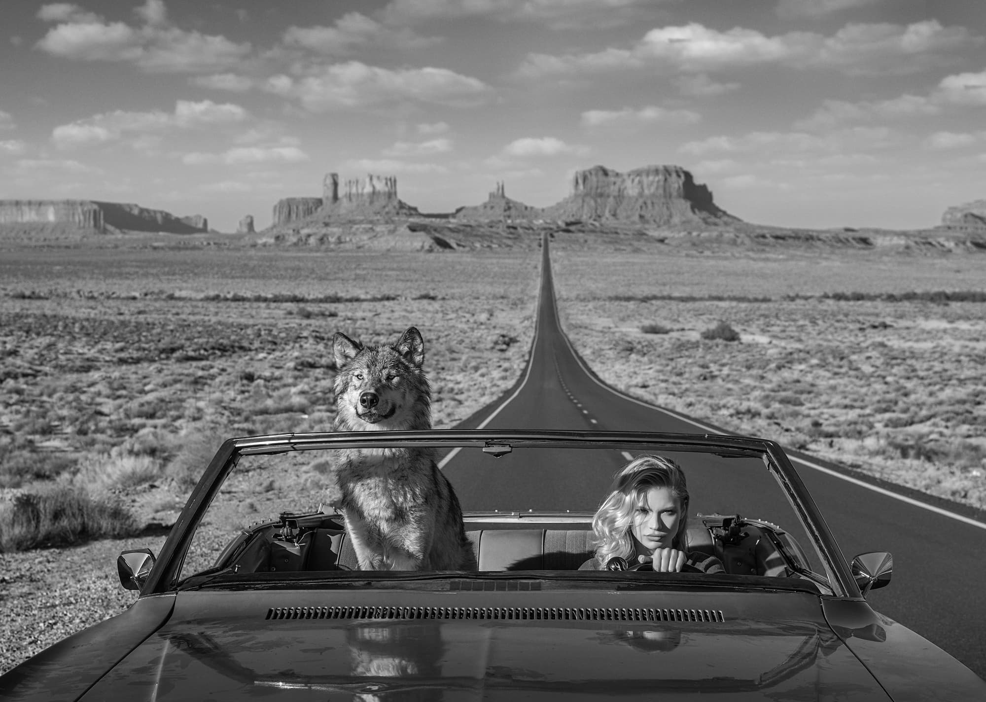 "Road Trip II" by David Yarrow, Monument Valley, Utah, 2018. Black and white photograph.