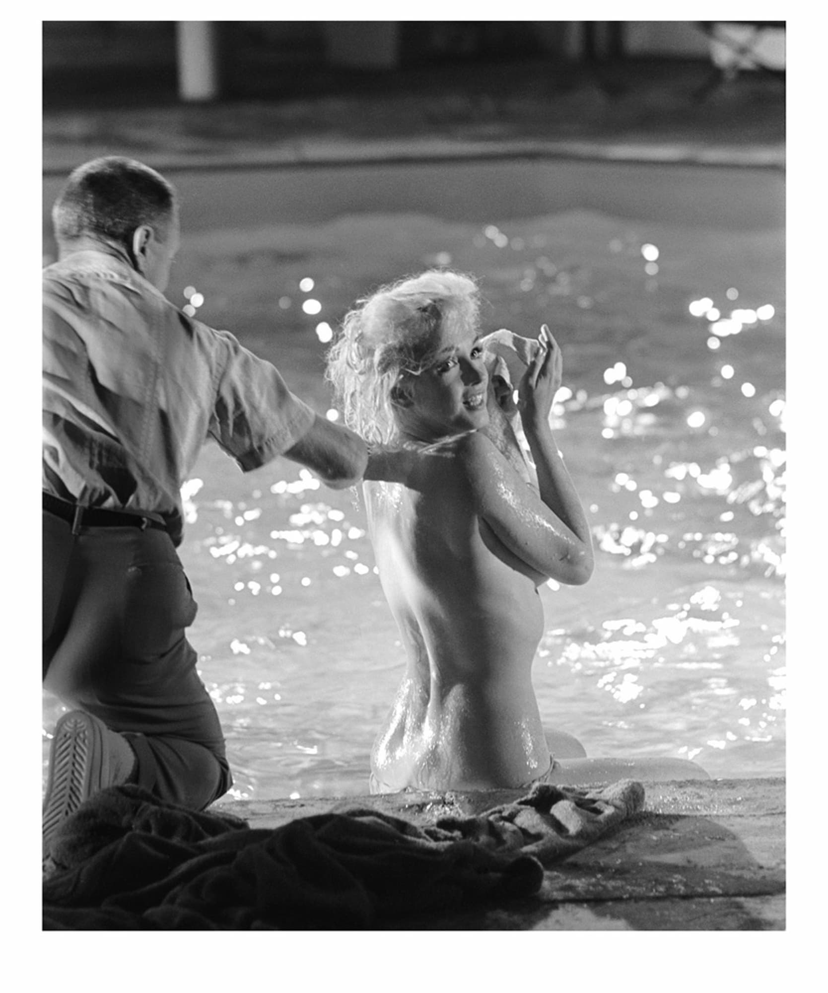 A photograph titled "On Set with Marilyn Monroe" by artist Lawrence Schiller.