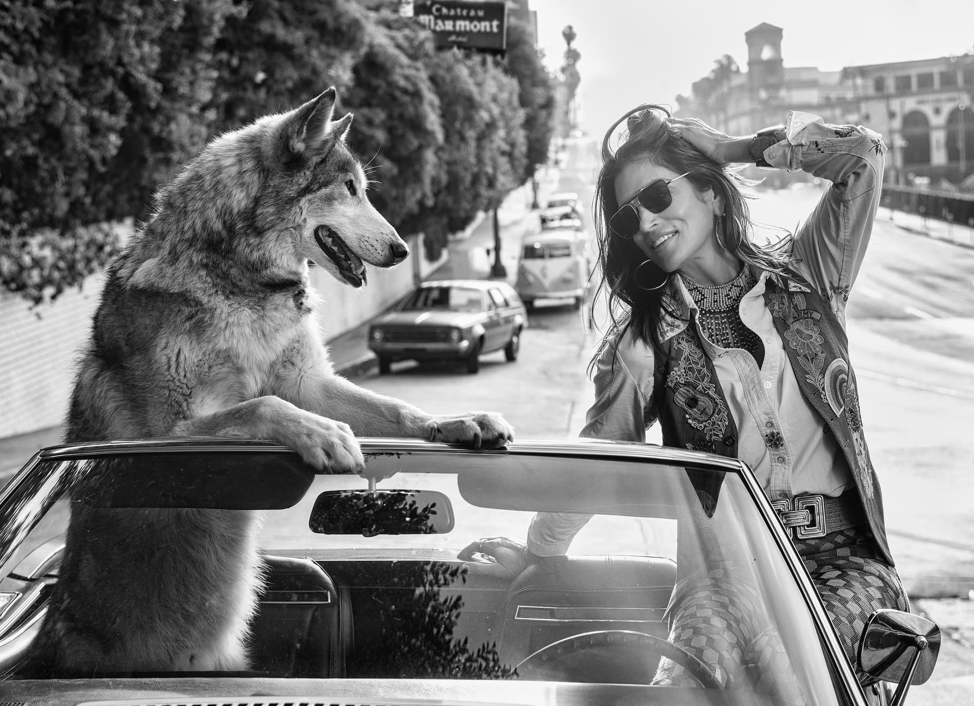 "The Fox and Hound" by David Yarrow, Los Angeles, California, 2022. Black and white photograph.