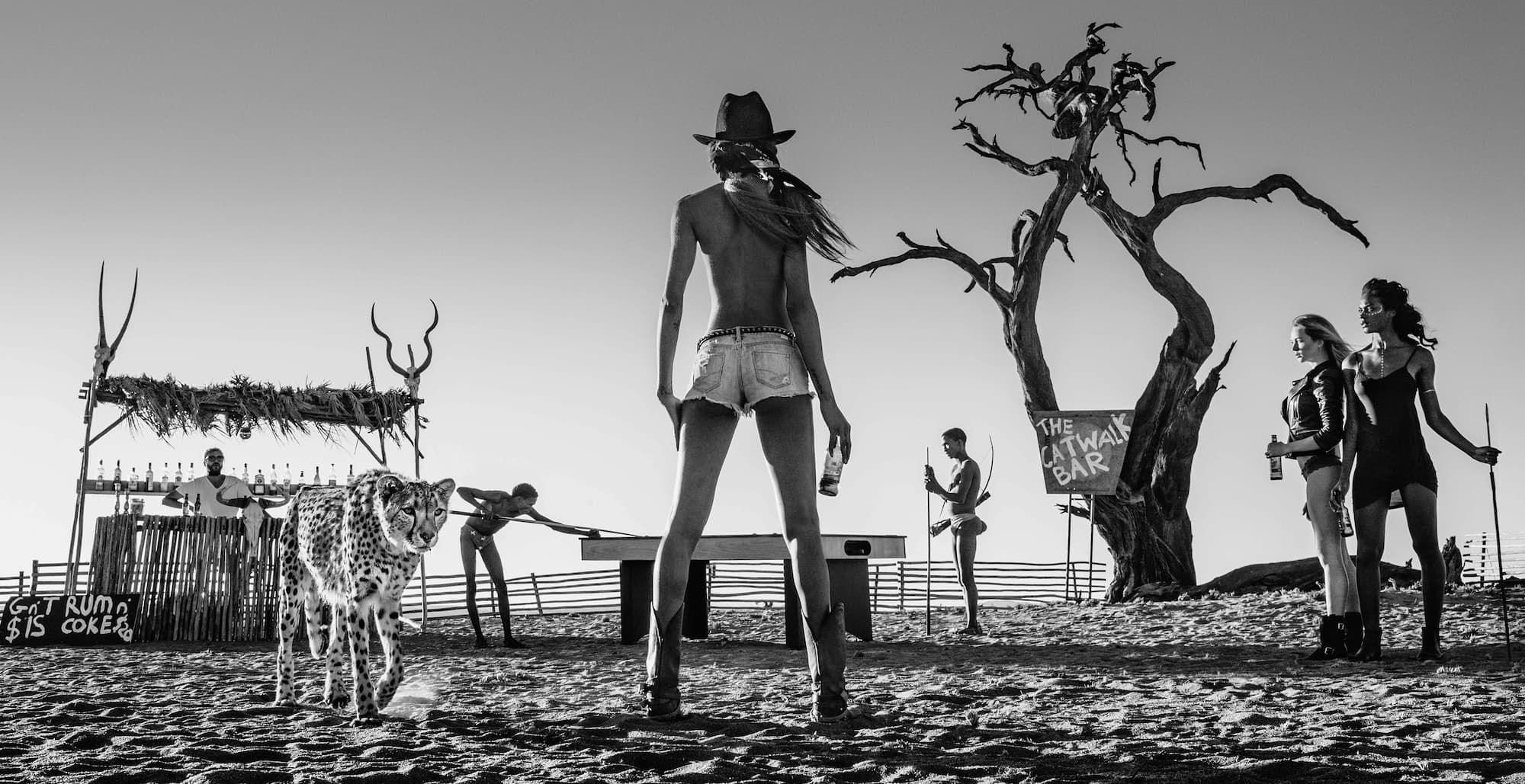 "The Good the Bad and the Ass" by David Yarrow, Namib Desert, Namibia, 2017. Black and white photograph.